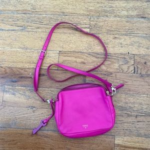 Used hot pink fossil cross body bag